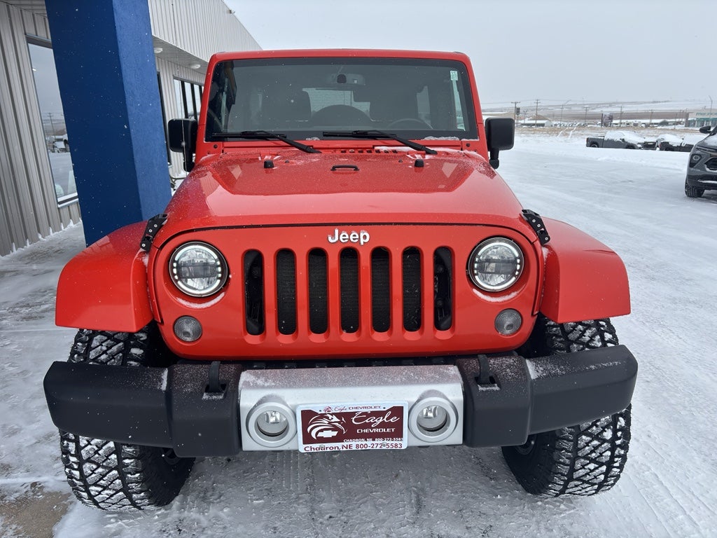 Used 2015 Jeep Wrangler Unlimited Sahara with VIN 1C4BJWEG6FL718545 for sale in Chadron, NE